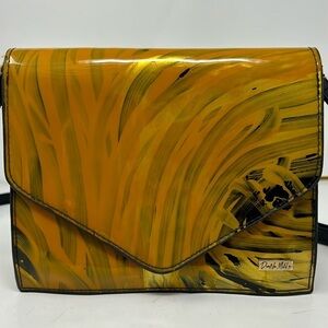 Small yellow  shoulder bags to hang on its side Danna motola